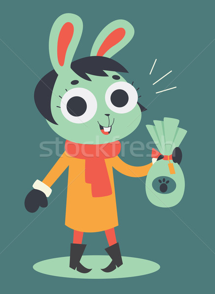 Cute Bunny Girl Holding a Chocolate Easter Egg Stock photo © penguinline