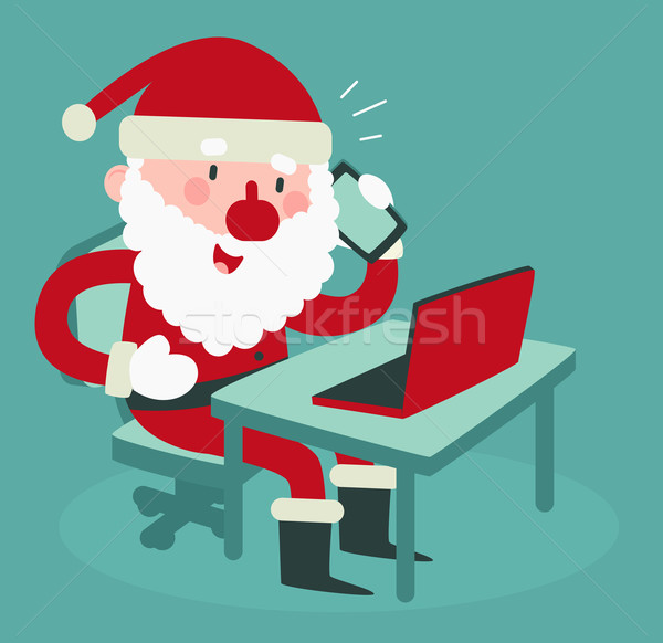 Cute Santa Holding a Cell Phone at the Computer Stock photo © penguinline