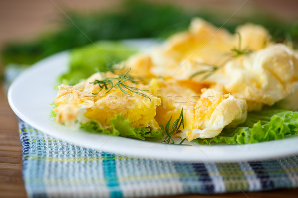 yolk baked into the beaten egg whites  Stock photo © Peredniankina