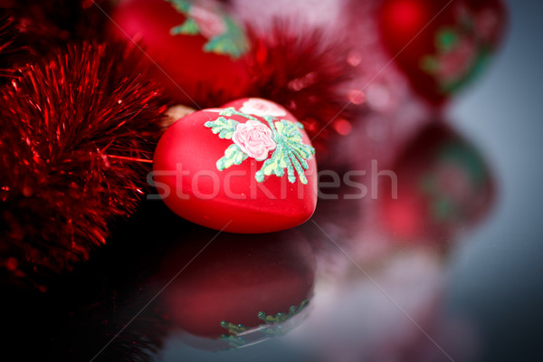 Christmas red hearts with red garland Stock photo © Peredniankina