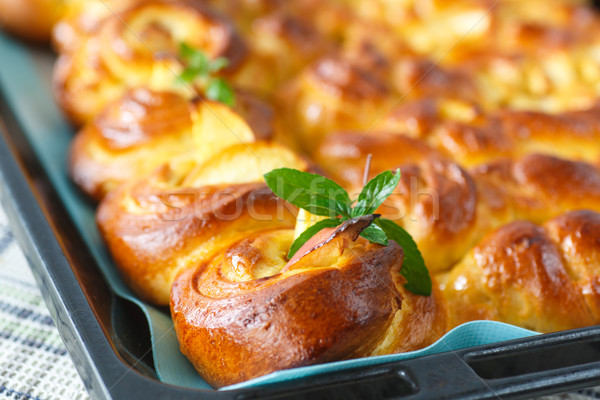 twisted sweet buns with apple Stock photo © Peredniankina