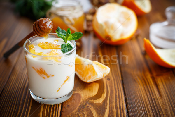Greek yogurt with honey and oranges Stock photo © Peredniankina