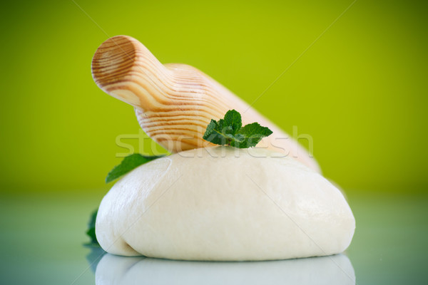 yeast dough with a wooden rolling pin Stock photo © Peredniankina