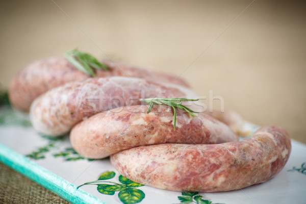 Crude homemade beef sausage Stock photo © Peredniankina