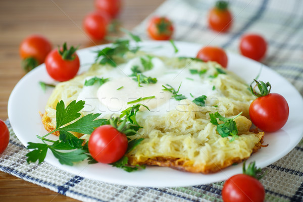 Egg baked in potatoes Stock photo © Peredniankina