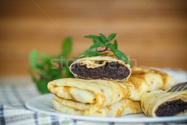 Stock photo: sweet pancakes with poppy seeds 