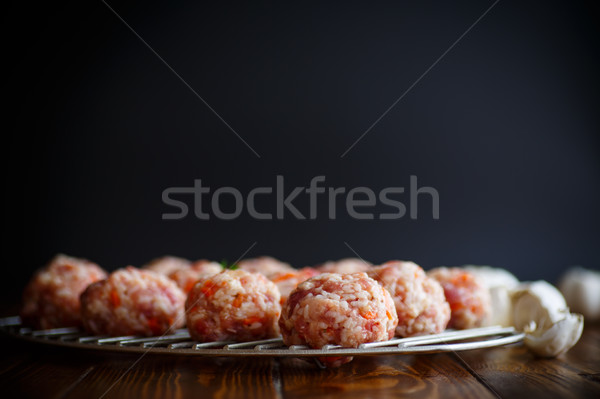 raw meatballs tangled meat with carrots Stock photo © Peredniankina