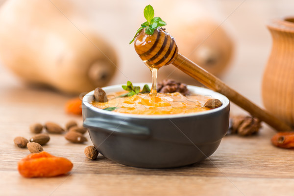 Stockfoto: Pompoen · honing · amandelen · voedsel · oranje · diner