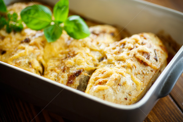 chicken baked with cheese and spices Stock photo © Peredniankina