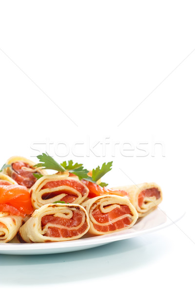 thin pancakes with salted red fish Stock photo © Peredniankina