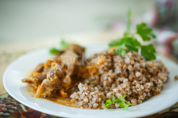 buckwheat cooked with stewed chicken gizzards Stock photo © Peredniankina