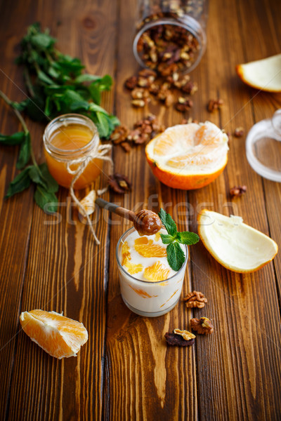 Greek yogurt with honey and oranges Stock photo © Peredniankina