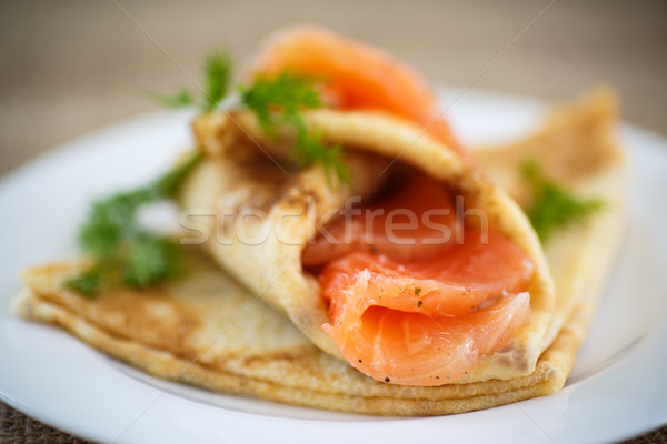 stack of pancakes with salted salmon Stock photo © Peredniankina