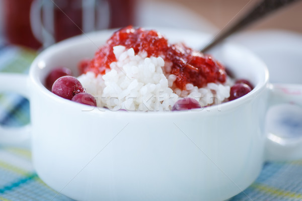 rice porridge with jam and berries Stock photo © Peredniankina