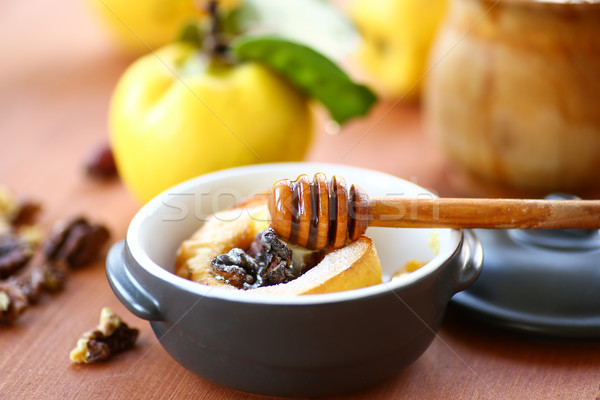 baked quince with walnuts and honey Stock photo © Peredniankina