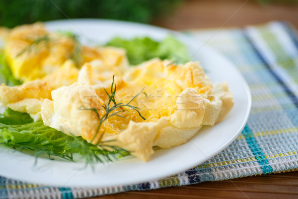 yolk baked into the beaten egg whites  Stock photo © Peredniankina