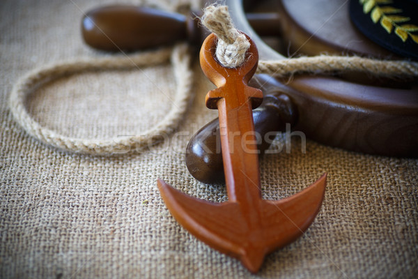 Decorative wooden ship anchored at the helm Stock photo © Peredniankina