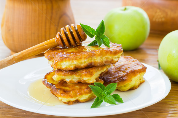  pancakes with apples and honey Stock photo © Peredniankina