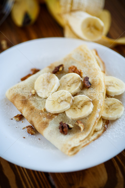 Zoete pannenkoeken bananen noten plaat ontbijt Stockfoto © Peredniankina