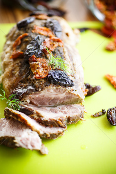 Meat baked with prunes and tomatoes Stock photo © Peredniankina