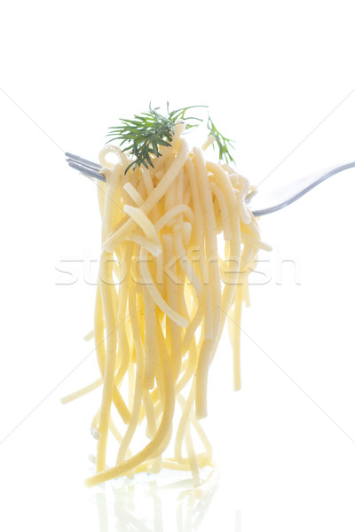 Gotowany spaghetti widelec biały wody tle Zdjęcia stock © Peredniankina