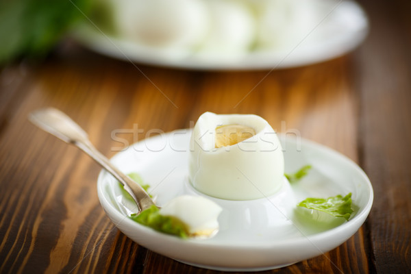 Huevo pasado por agua placa cuchara platillo huevos desayuno Foto stock © Peredniankina