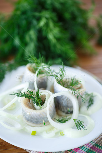 salted herring with onion rings and dill Stock photo © Peredniankina