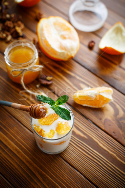 Greek yogurt with honey and oranges Stock photo © Peredniankina