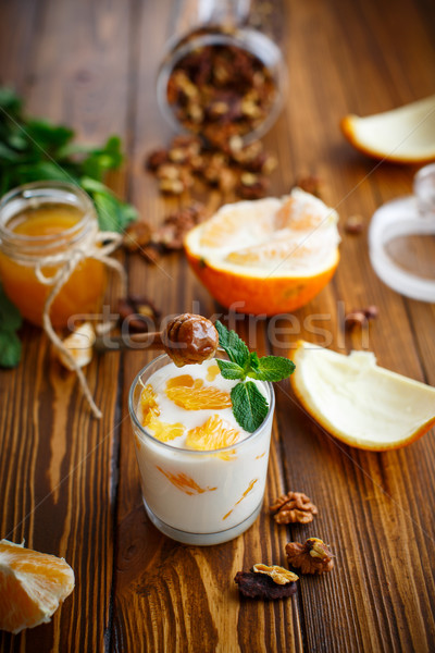 Greek yogurt with honey and oranges Stock photo © Peredniankina