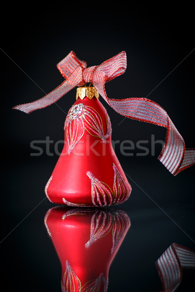 Christmas bell with red ribbon Stock photo © Peredniankina
