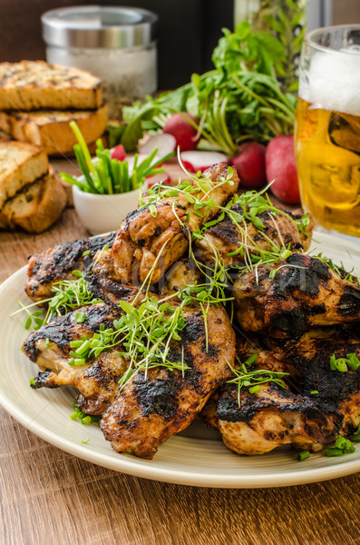 Grilled teriyaki chicken wings Stock photo © Peteer