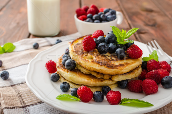Pancakes with forest fruit and mint Stock photo © Peteer