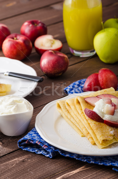 Cream pancakes with nectarines Stock photo © Peteer