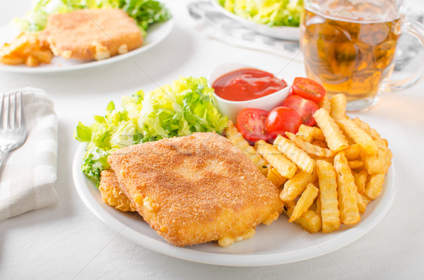 Fried cheese with french fries and lettuce Stock photo © Peteer