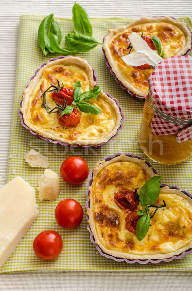 Quiche with cheese and cherry tomatoes Stock photo © Peteer