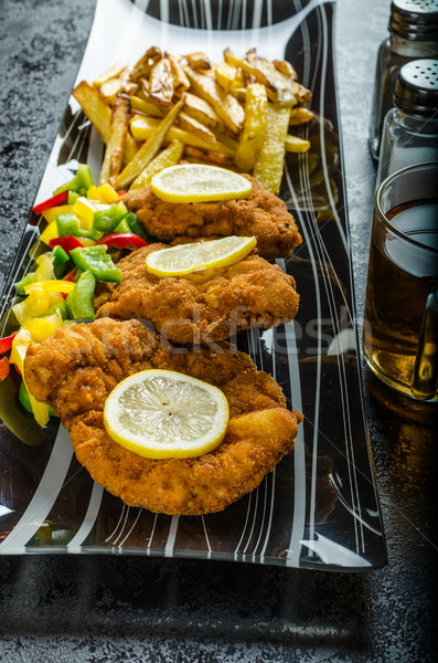 Schnitzel with french fries Stock photo © Peteer