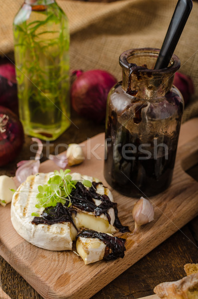 Toasted bread with brie cheese and caramelized onions Stock photo © Peteer