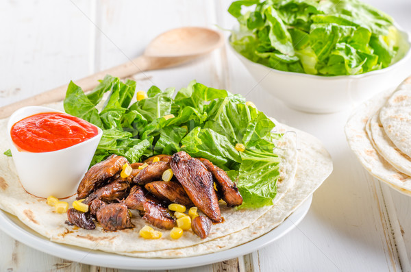 Chicken teriyaki salad on tortilla Stock photo © Peteer