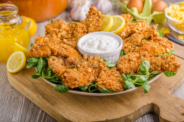 Chicken strips with delish garlic dip Stock photo © Peteer