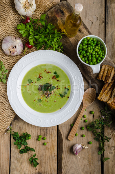 Soup of young peas Stock photo © Peteer