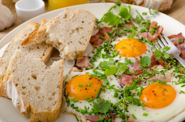 Spring omelette with bacon, egg and herbs Stock photo © Peteer