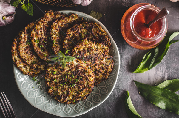 Potato pancakes fried with garlic Stock photo © Peteer