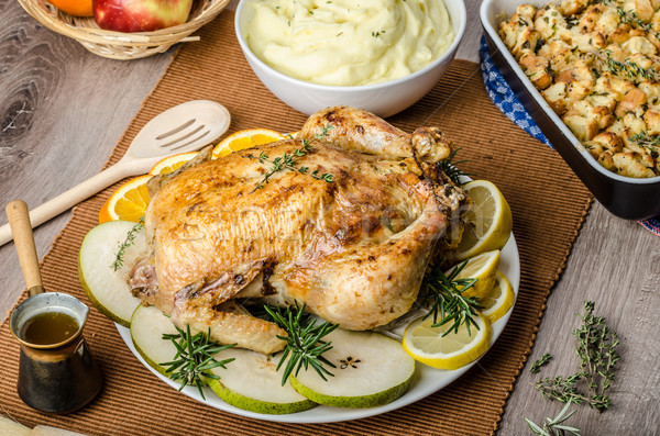 Feasting - stuffed roast chicken with herbs Stock photo © Peteer