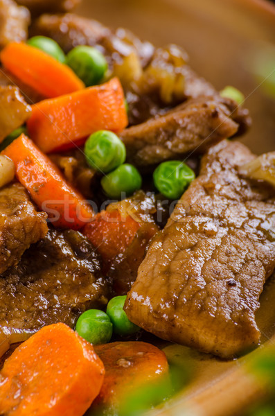 Pork medallions with vegetable and soy garlic sauce Stock photo © Peteer
