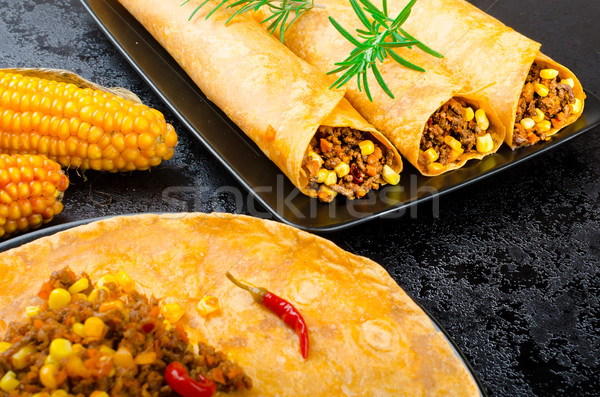 Tomato tortilla with spicy meat mixture Stock photo © Peteer
