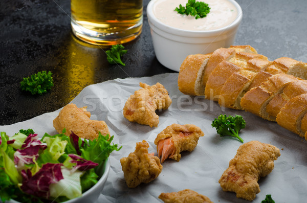 Salmon in herb batter with spicy dressing Stock photo © Peteer