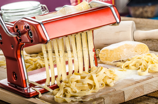 Production of homemade pasta - Italian pasta grinder Stock photo © Peteer