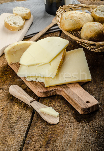 Delicious ripe cheese with crispy baguette and wine Stock photo © Peteer