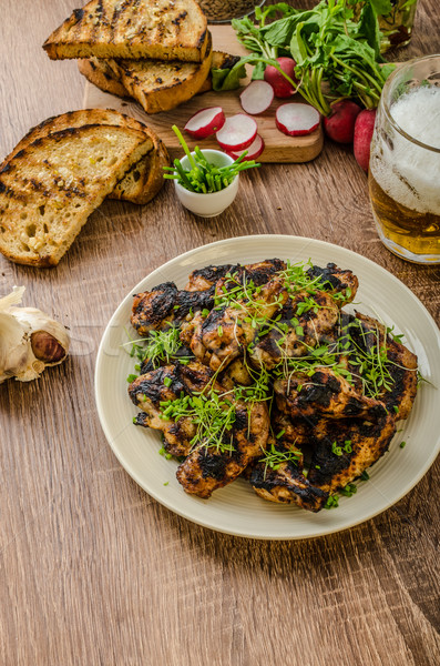 Grilled teriyaki chicken wings Stock photo © Peteer