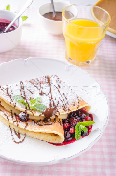 Homemade crepes with berries Stock photo © Peteer